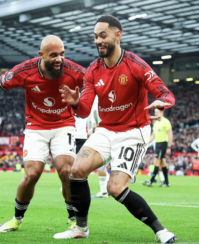 Matheus Cunha and Bryan Mbeumo celebrate a gaol
